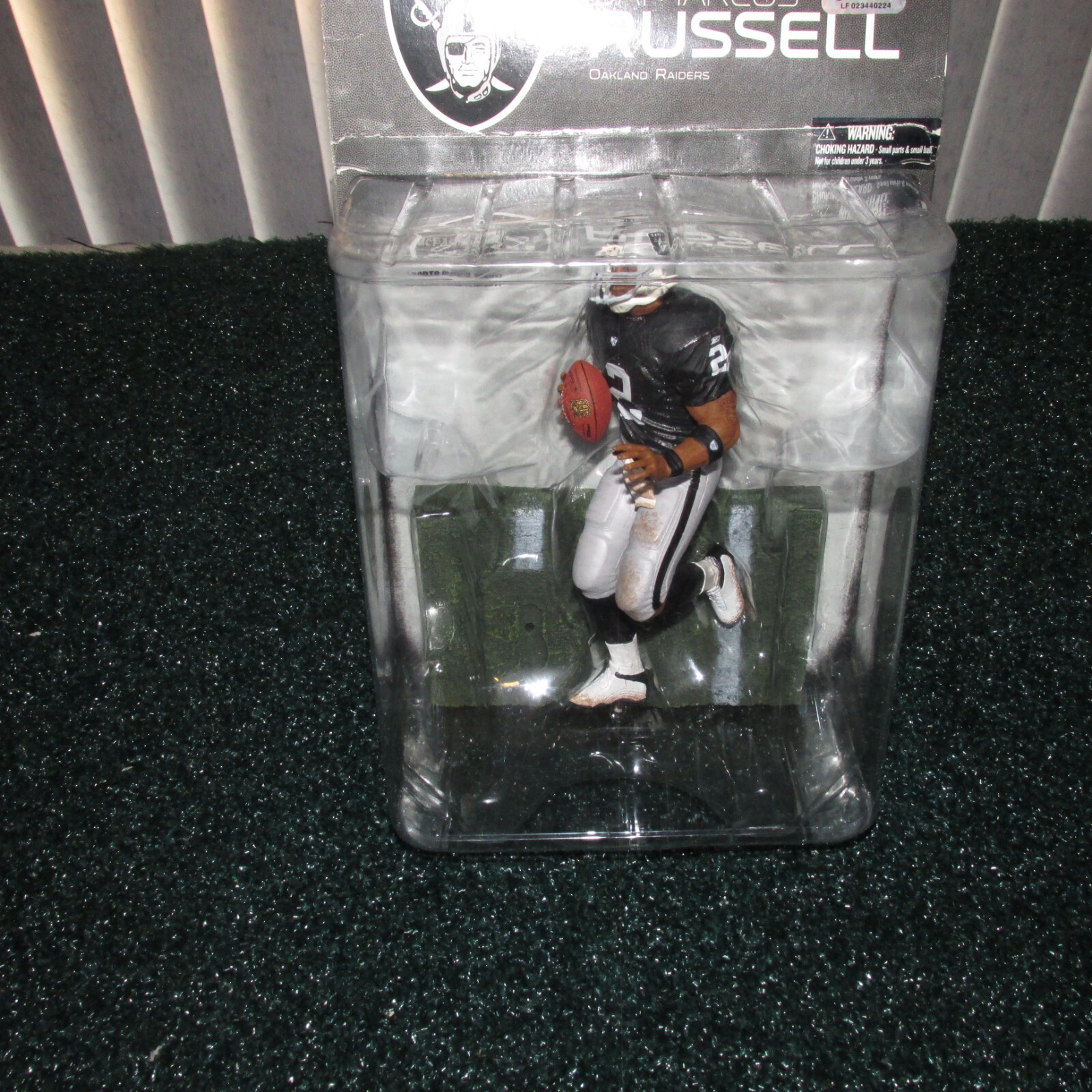 McFarlane 2008 JaMarcus Russell Oakland Raiders series 17 (rookie piece)