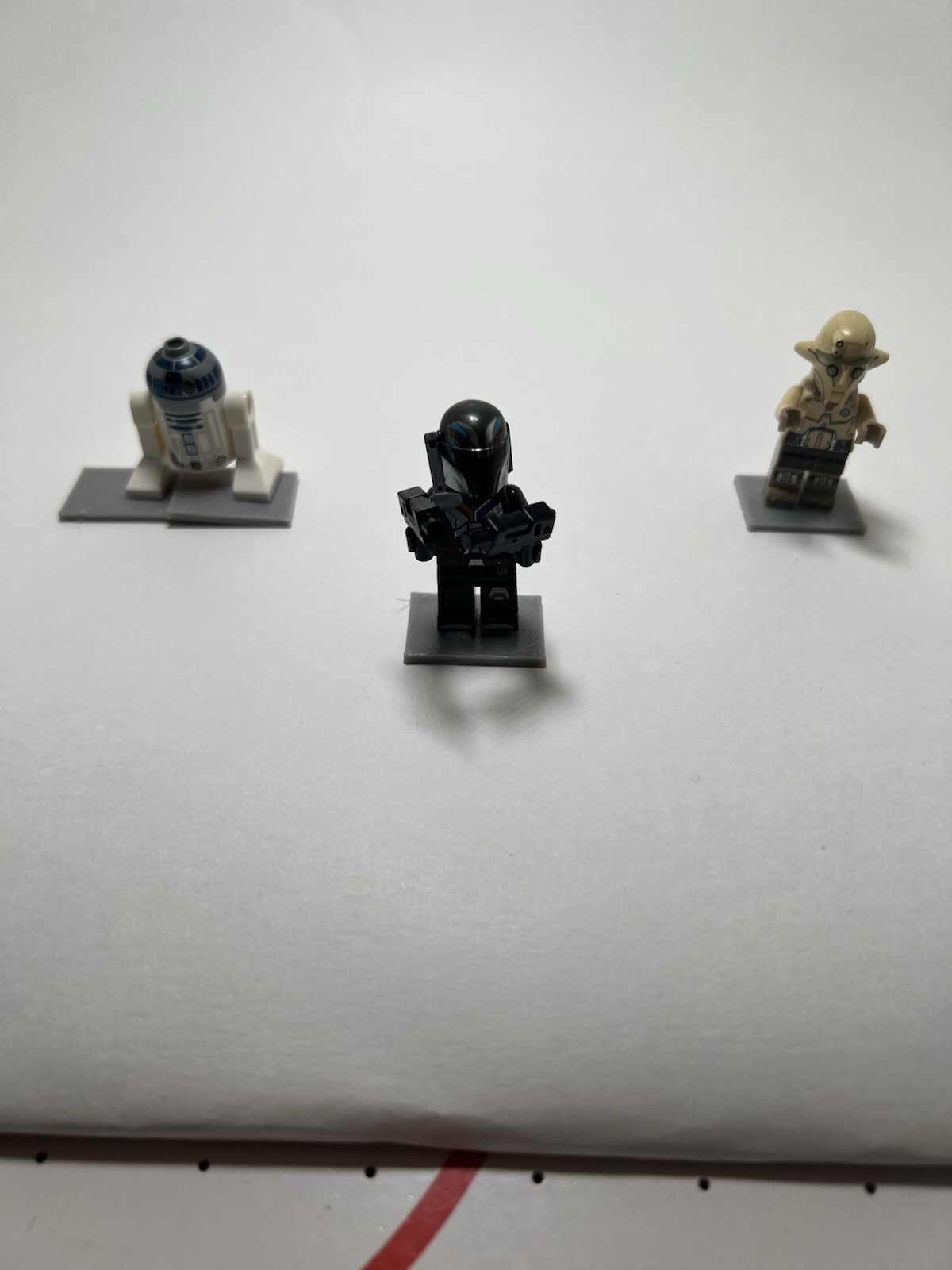 15 Gray Rectangular Stands For Lego Characters.