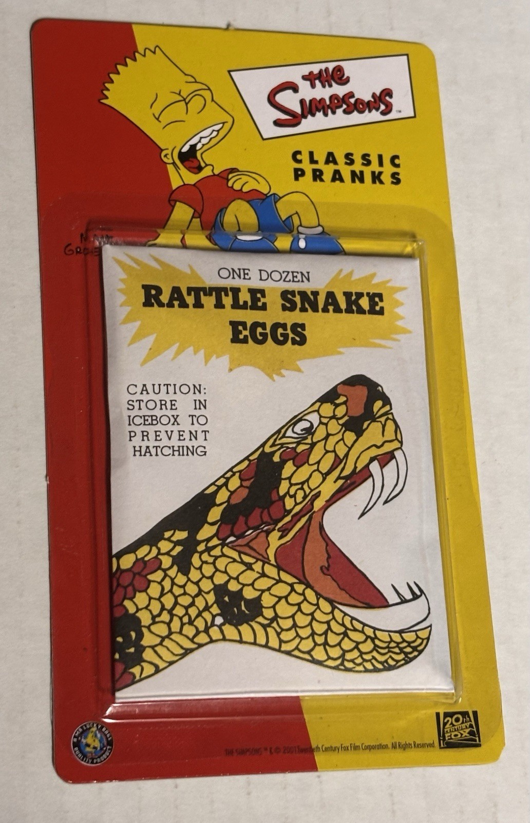 RARE The SIMPSONS – 2001 Classic Pranks “RATTLE SNAKE EGGS” (MOC)=United Kingdom