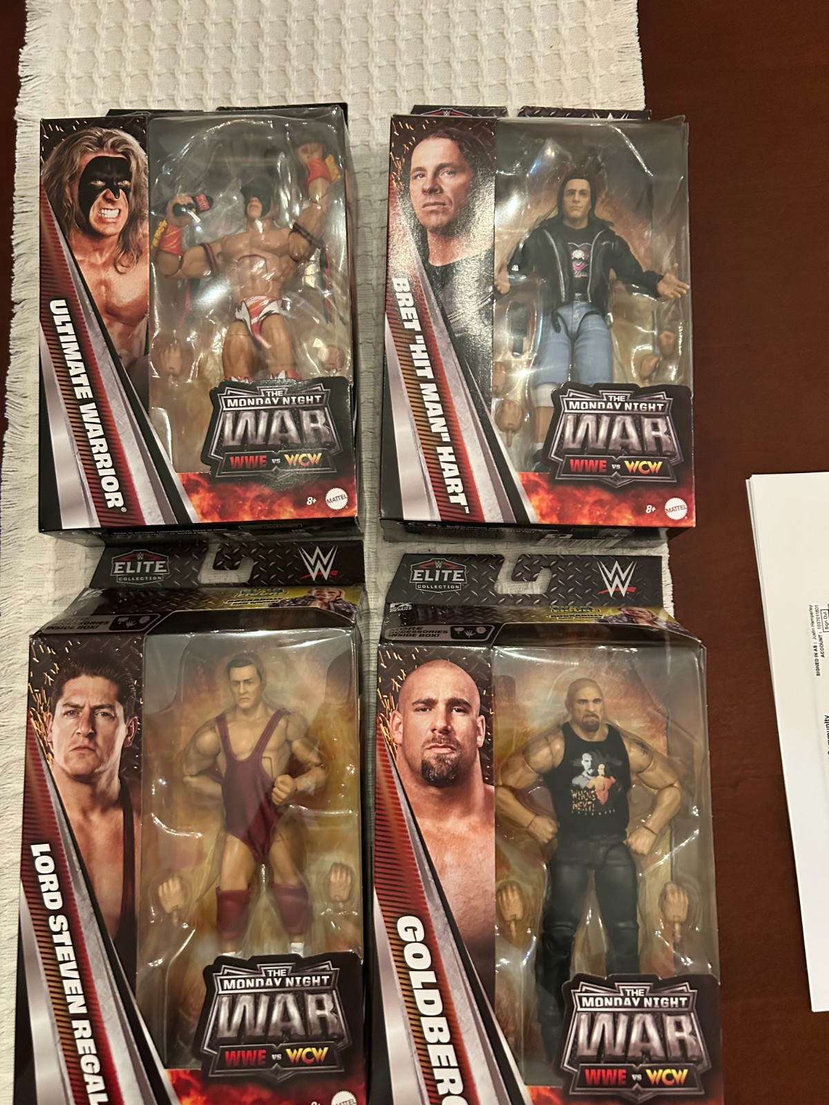 WWE Elite Monday Night War Series 12 Goldberg, Bret Hart, Warrior & Steven Regal